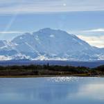 Denali rises in the distance behind Wonder Lake in Denali National Park and Preserve. (Klas Stolpe)