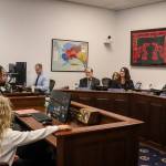Ephraim Froelich, a Juneau resident, testifies in support of House Bill 69 on Jan. 29, 2025. His son, who attends first grade in the Juneau School District, sits beside him. (Jasz Garrett / Juneau Empire)