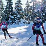 Community skier Aldyn Brudie (111) and JDHS Nordic Ski senior Finley Hightower (64) race during the Shaky Shakeout Invitational six-kilometer freestyle mass start Saturday at Eaglecrest Ski Area. (Klas Stolpe / Juneau Empire)