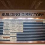 A building directory in Juneaus federal building lists departments, such as the U.S. Coast Guard, U.S. Forest Service, and the National Oceanic and Atmospheric Administration. (Jasz Garrett / Juneau Empire)