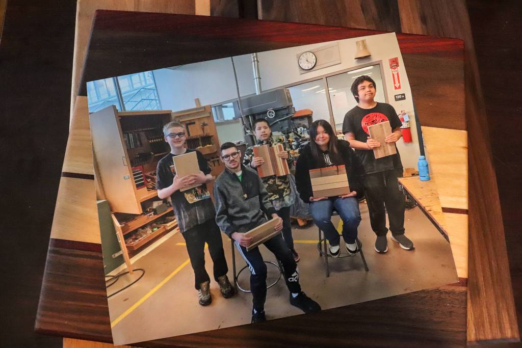 Students with special needs from Juneau-Douglas High School: Yadaa.at Kalé toured Juneau Animal Rescue and created cutting boards in a class to donate as part of the shelters silent auction this Saturday. (Jasz Garrett / Juneau Empire)