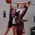 Juneau-Douglas High School: Yadaa.at Kalé senior Cailynn Baxter is fouled while shooting over Ketchikan senior Aspen Bauer (13) and junior Kari Klinger (20) during the Crimson Bears 51-23 win over the Lady Kings on Friday in Juneau. (Klas Stolpe / Juneau Empire)