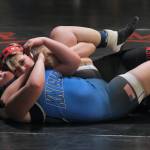 Thunder Mountain Middle School eighth grader Phoebe Martin pins Schoenbars Kyra Hedlind for the 176-pound championship during the Southeast Middle School Regional Wrestling Tournament on Saturday at TMMS. (Klas Stolpe / Juneau Empire)