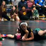 Hoonahs Ava Hinchman pins Craigs Eva Clark for the girls 156-pound championship during the Southeast Middle School Regional Wrestling Tournament on Saturday at Thunder Mountain Middle School. (Klas Stolpe / Juneau Empire)