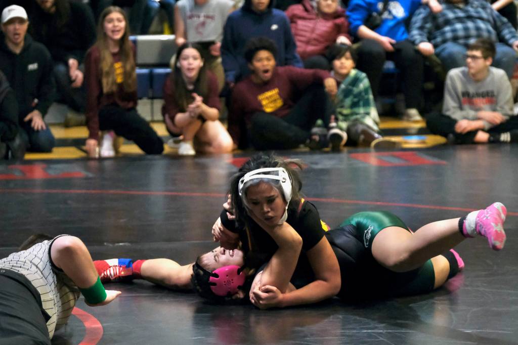Hoonahs Ava Hinchman pins Craigs Eva Clark for the girls 156-pound championship during the Southeast Middle School Regional Wrestling Tournament on Saturday at Thunder Mountain Middle School. (Klas Stolpe / Juneau Empire)