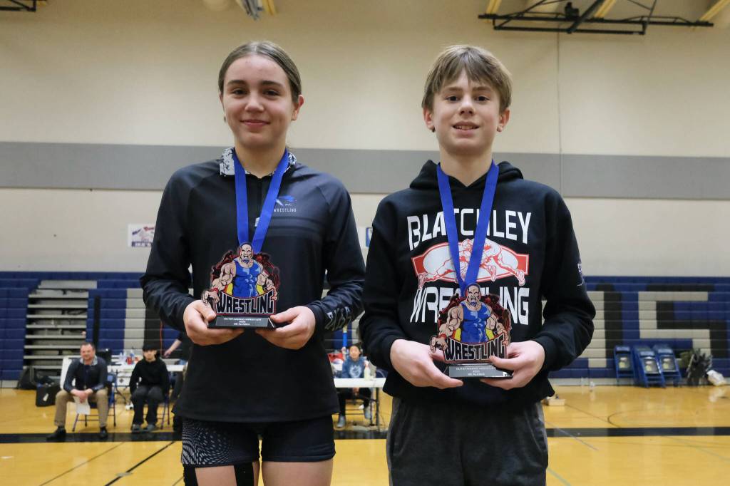 Thunder Mountain Middle School seventh grader Minali Reid and Blatchley eighth grader Jene Keith were named the girls and boys, respectively, Outstanding Wrestler of the Southeast Middle School Regional Wrestling Tournament on Saturday at TMMS. (Klas Stolpe / Juneau Empire)