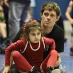 Della Churchill at age six in one of her first Wrangell Parks & Recreation wrestling tournaments with her father Randy Churchill Jr. (Photo courtesy Della Churchill)