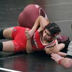 Wrangell senior Della Churchill pins Ketchikans Minh-thu Vo during their 126-pound match at the 2024 Southeast Showdown Wrestling Tournament in Juneaus George Houston Gymnasium. (Klas Stolpe / Juneau Empire)