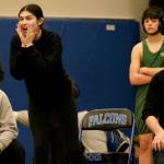 Wrangell senior Della Churchill shouts instructions to a Stikine Middle School wrestler as coach Jack Carney looks on during the Southeast Middle School Regional Wrestling Championships at Thunder Mountain Middle School last week. (Klas Stolpe / Juneau Empire)