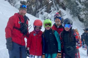 Juneau Ski Clubs coach Kevin Stell, Elaine Duvall, Marin Lowell, coach Brock Tabor and McKinley Burgess-Fitzpatrick pose Friday at the Alyeska Cup races in Girdwood. (Photo courtesy JSC)