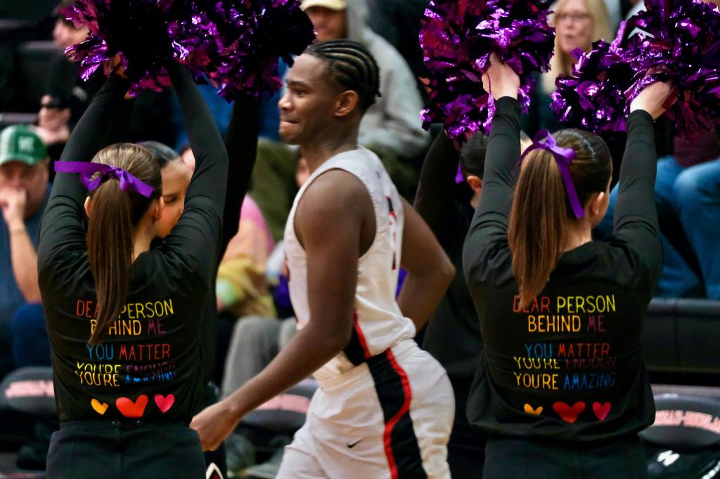 Juneau-Douglas High School: Yadaa.at Kalé cheer team members wore shirts supporting mental health awareness during Fridays games against Monroe. (Klas Stolpe / Juneau Empire)