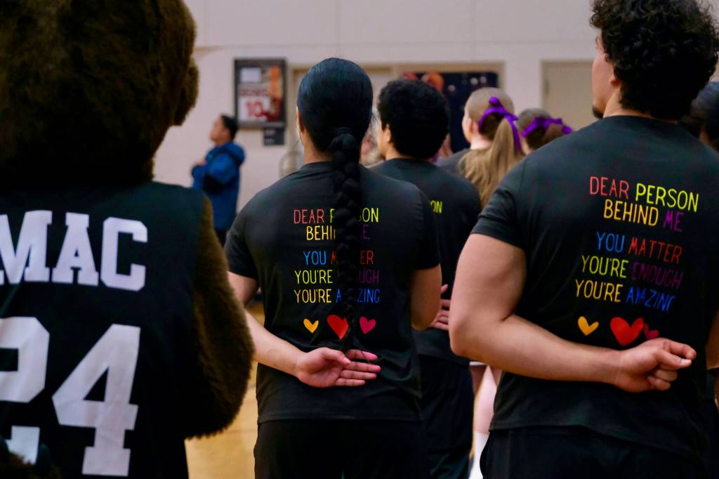 Juneau-Douglas High School: Yadaa.at Kalé cheer team members wore shirts supporting mental health awareness during Fridays games against Monroe. (Klas Stolpe / Juneau Empire)