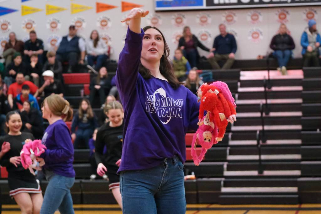 Miss Glacier Bay USA Holly Huber helps with a mental health awareness promotion during Fridays Juneau-Douglas High School: Yadaa.at Kalé basketball games against visiting Monroe. (Klas Stolpe / Juneau Empire)