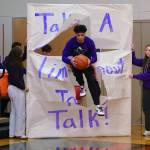 The Juneau-Douglas High School: Yadaa.at Kalé senior Pedrin Saceda-Hurt leads the Crimson Bears onto the court Friday before their 76-55 loss to the Monroe Rams. (Klas Stolpe / Juneau Empire)