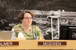 Juneau Municipal Clerk Beth McEwen listens to a discussion during a Juneau Assembly meeting Monday, Dec. 11, 2023. She was named the Municipal Clerk of the Year by the Alaska Association of Municipal Clerks the previous week. (Mark Sabbatini / Juneau Empire)