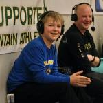 Skagway radio announcer Mason Jennings, 13, and his father Nathan Jennings calling action at the Region V 1A tournament on Wednesday at Thunder Mountain Middle School. (Klas Stolpe / Juneau Empire)
