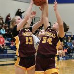 Hoonahs Paige Woitte (13) and Charlie Jack (34) rebound over Skagways Kelsey Cox in the Braves overtime win over the Panthers on Thursday during the 2025 Alaska Airlines Region V 1A Girls Basketball Tournament at Thunder Mountain Middle School. (Klas Stolpe / Juneau Empire)
