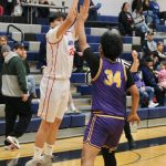 Kakes Devin Aceveda (35) shoots over Hydaburgs Maika Olap (34) in the Thunderbirds win over the Warriors on Thursday during the 2025 Alaska Airlines Region V 1A Boys Basketball Tournament at Thunder Mountain Middle School. (Klas Stolpe / Juneau Empire)