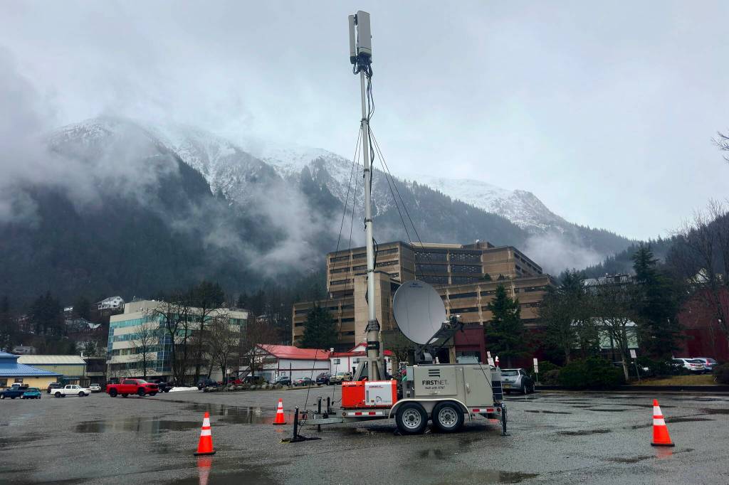 A portable FirstNet cell tower to provide ATT service is set up in the parking lot of the Juneau Arts and Culture Center on Friday afternoon following a widespread phone and internet outage that began Thursday night. (Mark Sabbatini / Juneau Empire)