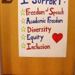 A poster that was added in the University of Alaska Southeast Egan Library following the University of Alaska Board of Regents decision on Friday, Feb. 21, shows a librarians support for freedom of speech, academic freedom, diversity, equity and inclusion. (Jasz Garrett / Juneau Empire)