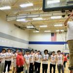 Kake coach Anthony Ross cuts down the net after the Thunderbirds’ 56-40 win over the Klawock Chieftains on Friday during the Region V 1A Boys Basketball Tournament Championship game at Thunder Mountain Middle School. (Klas Stolpe / Juneau Empire)