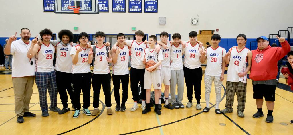 The Kake Thunderbirds pose after their 56-40 win over the Klawock Chieftains on Friday during the Region V 1A Boys Basketball Tournament Championship game at Thunder Mountain Middle School. (Klas Stolpe / Juneau Empire)