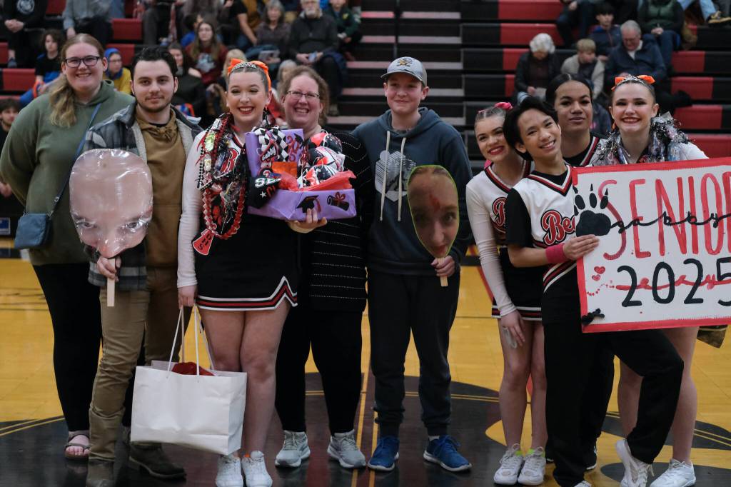 Friends and family of Juneau-Douglas High School: Yadaa.at Kalé Crimson Bears senior Gabby Ely during Senior Night honors Saturday at the George Houston Gymnasium. (Klas Stolpe / Juneau Empire)