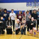 Members of the Good Sport Team are shown Saturday at the Region V 1A Basketball Tournament at Thunder Mountain Middle School. (Klas Stolpe / Juneau Empire)