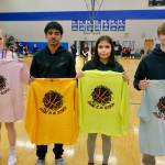 Three-Point champions Paige Woitte (HNH) and Alan Koneki (HYD) stand with Free Throw champions Macy Alander (HYD) and Tristin Ryno (KLWK). (Klas Stolpe / Juneau Empire).