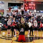 The Juneau-Douglas High School: Yadaa.at Kalé cheer team is shown during last weekend's homecoming series against North Pole. They will be bringing their spirit to the 2A/4A Region V championships in Ketchikan starting Thursday. (Klas Stolpe / Juneau Empire)