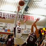 Juneau-Douglas High School: Yadaa.at Kalés Kerra Baxter makes a layup during JDHS 64-36 victory over Ketchikan on the first day of the Region V 4A Basketball Tournament at the Clarke Cochrane Gymnasium on Thursday. (Christopher Mullen / Ketchikan Daily News)