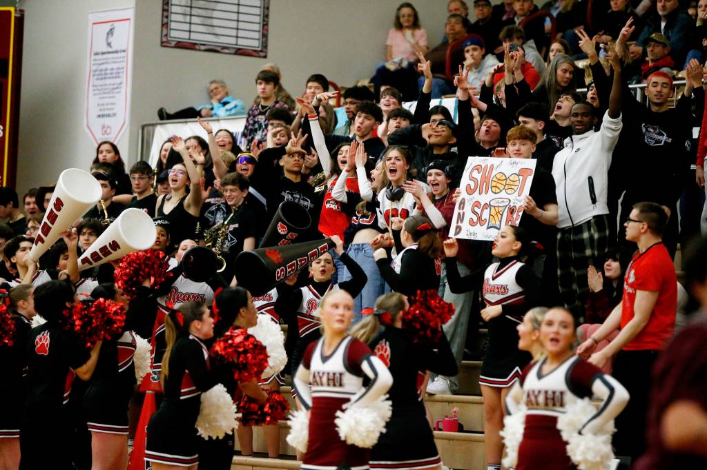 Juneau-Douglas High School: Yadaa.at Kalé fans cheer during JDHS 64-36 victory over Ketchikan on the first day of the Region V 4A Basketball Tournament at the Clarke Cochrane Gymnasium on Thursday. (Christopher Mullen / Ketchikan Daily News)