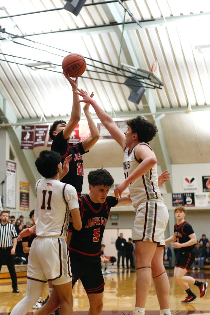 Juneau-Douglas High School: Yadaa.at Kalés Elias Dybdahl shoots the ball during JDHS 56-43 loss to Ketchikan on the first day of the Region V 4A Basketball Tournament at the Clarke Cochrane Gymnasium on Thursday. (Christopher Mullen/ Ketchikan Daily News)