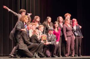 The Juneau-Douglas High School: Yadaa.at Kalé drama, debate and forensics state championship team are shown on stage at the 2025 ASAA state championships at Bettye Davis East Anchorage High School on Saturday. (Photo courtesy JDHS)