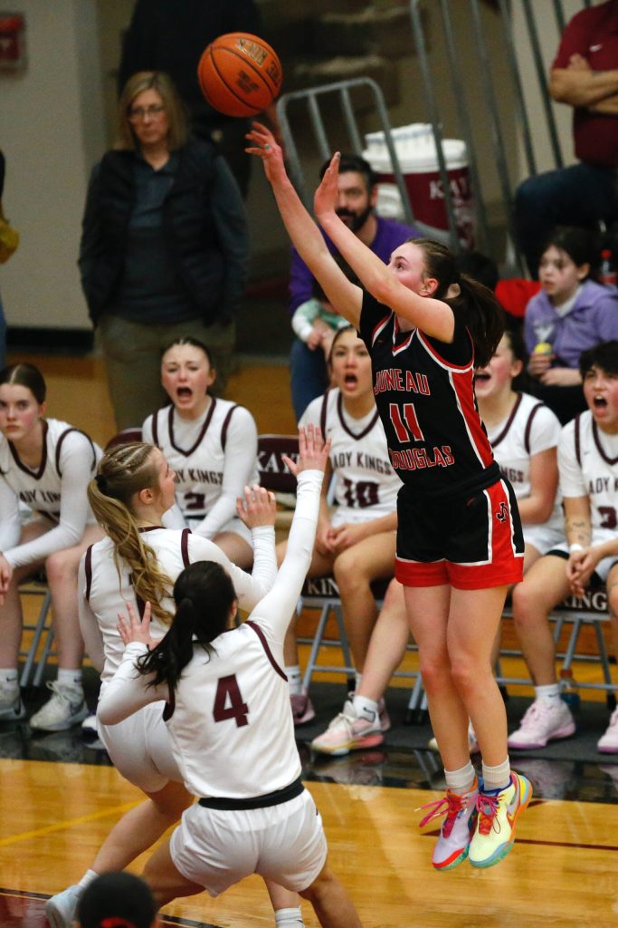 Juneau-Douglas High School: Yadaa.at Kalés Gwen Nizich shoots the ball during Juneau-Douglass 65-43 victory over Ketchikan, winning the Region V 4A Basketball Tournament at the Clarke Cochrane Gymnasium on Friday. Juneau-Douglas eliminated Ketchikan and will advance to play at state. (Christopher Mullen / Ketchikan Daily News)