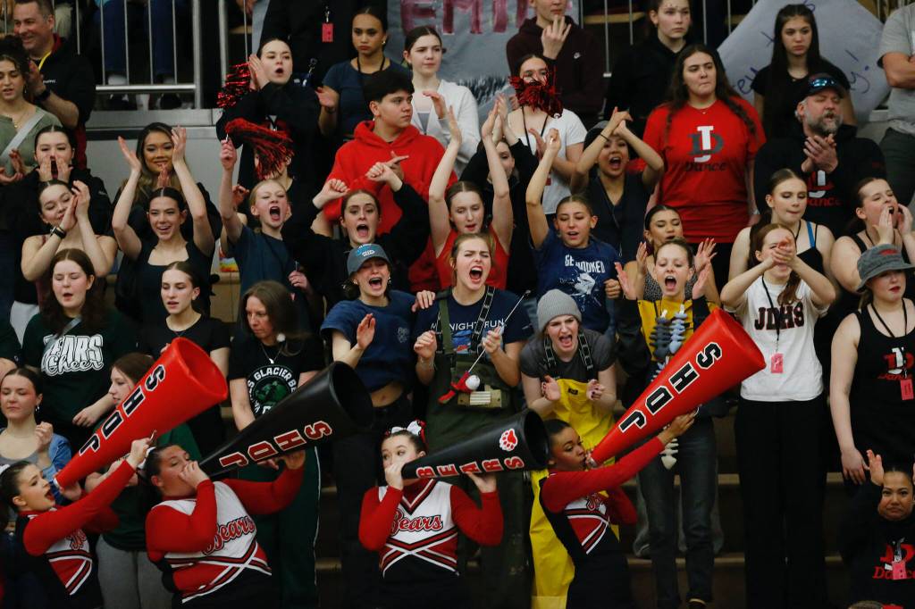 Juneau-Douglas High School: Yadaa.at Kalés pep club cheers during Juneau-Douglass 65-43 victory over Ketchikan, winning the Region V 4A Basketball Tournament at the Clarke Cochrane Gymnasium on Friday. Juneau-Douglas eliminated Ketchikan and will advance to play at state. (Christopher Mullen / Ketchikan Daily News)
