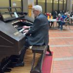 Jonas Nordwall performs a noontime concert on the 1928 Kimball Theatre Pipe Organ at the State Office Building on Friday. (Mark Sabbatini / Juneau Empire)
