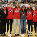 The 4A Girls All Conference players Juneau-Douglas Layla Tokuoka, Kerra Baxter, Caiylnn Baxter, Kayhis Aspen Bauer, Juneau-Douglas Gwen Nizich and Cambry Lockhart stand for a photo at the Clarke Cochrane Gymnasium on Saturday. (Christopher Mullen / Ketchikan Daily News)