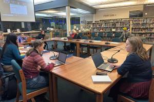 Nicole Herbert, who this month became the new chief financial officer for the Juneau School District, explains details of next years proposed budget to the Juneau Board of Education on Tuesday night at Thunder Mountain Middle School. (Mark Sabbatini / Juneau Empire)