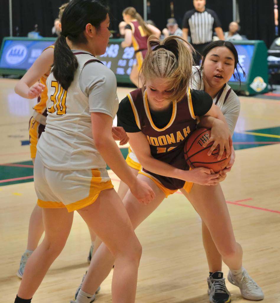 Hoonahs Paige Woitte fights for a rebound against Shaktoolik during the Braves 55-37 loss to the Huskies Thursday in the 2025 ASAA March Madness Alaska 1A State Basketball Championships at Anchorages Alaska Airlines Center. (Klas Stolpe / Juneau Empire)