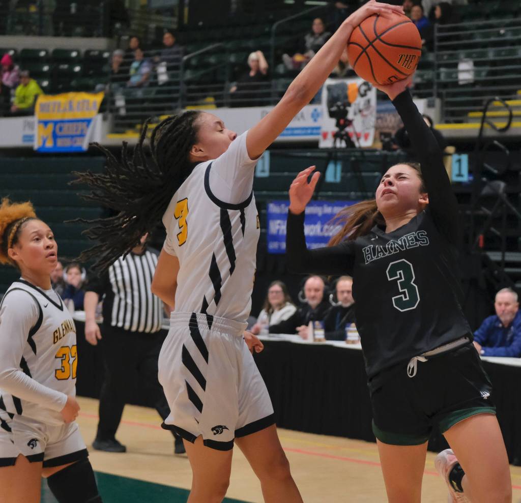 Skagways Logan Rupprecht (23) challenges Scammon Bays Mica Uttereyuk (42) during the Panthers 71-48 win over the Eagles on Thursday in the 2025 ASAA March Madness Alaska 1A State Basketball Championships at Anchorages Alaska Airlines Center (Klas Stolpe / Juneau Empire)