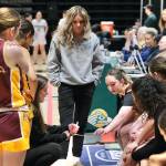 Hoonah coach Marlene Duvall, assistant coach Krista Howland and the Braves design a play in their 43-40 loss to the Shishmaref Northern Lights on Friday in the 2025 ASAA March Madness Alaska 1A State Basketball Championships at Anchorages Alaska Airlines Center (Klas Stolpe / Juneau Empire)
