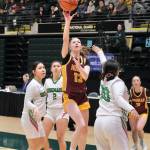 Hoonahs Paige Woitte scores over Shishmarefs Renee Kiyutelluk (30) during the Braves 43-40 loss to the Northern Lights on Friday in the 2025 ASAA March Madness Alaska 1A State Basketball Championships at Anchorages Alaska Airlines Center (Klas Stolpe / Juneau Empire)