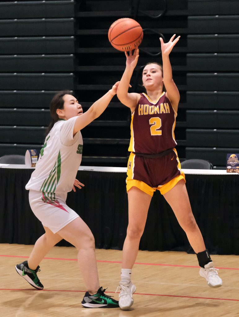Hoonahs Jenna Jack is fouled by a Shishmaref defender during the Braves 43-40 loss to the Northern Lights on Friday in the 2025 ASAA March Madness Alaska 1A State Basketball Championships at Anchorages Alaska Airlines Center (Klas Stolpe / Juneau Empire)