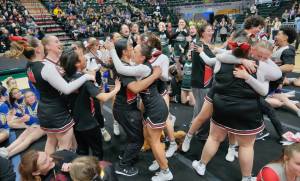 Klas Stolpe / Juneau Empire
The Juneau-Douglas High School: Yadaa.at Kalé Crimson Bears cheer team celebrate after being announced as the Division I 2025 ASAA Cheer State champions Tuesday at Anchorages Alaska Airlines Center.