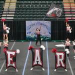 The Juneau-Douglas High School: Yadaa.at Kalé Crimson Bears cheer team perform during the Division I 2025 ASAA Cheer State Championships Tuesday at Anchorages Alaska Airlines Center. (Klas Stolpe / Juneau Empire)