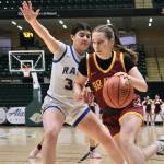 Mt. Edgecumbe sophomore Gracelynn Friske (12) dribbles past Monroe junior Trinity Turiel (32) during Lady Braves 42-30 loss to the Rams on Wednesday at the 2025 ASAA March Madness Alaska 3A/4A Basketball State Championships in Anchorages Alaska Airlines Center. (Klas Stolpe / Juneau Empire)