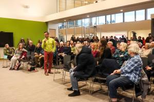 Andy Romanoff, the executive director of the nonprofit organization Alaska Heat Smart, speaks at an empty-chair town hall held for U.S. Sen. Dan Sullivan (R-Alaska) on Thursday, March 20, 2025. (Jasz Garrett / Juneau Empire)