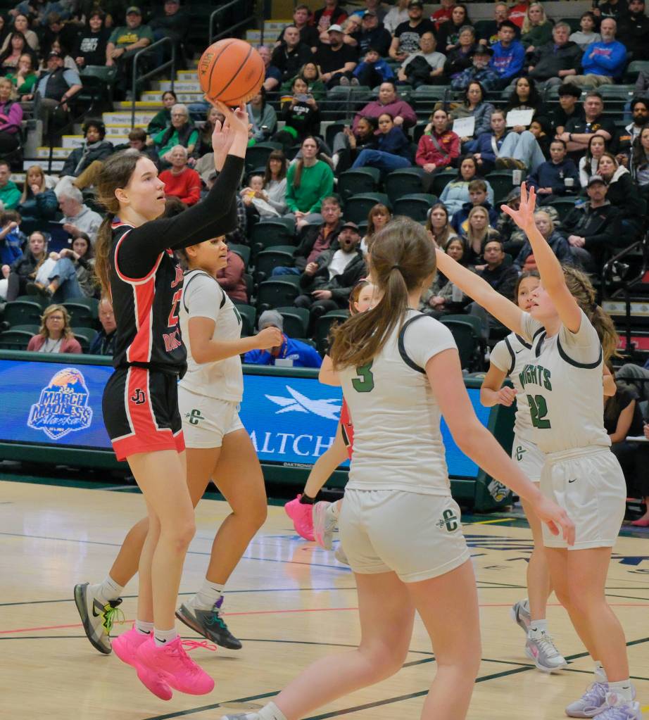 Juneau-Douglas High School: Yadaa.at Kalé senior Cailynn Baxter shoots against Colony during the Crimson Bears 56-34 loss to the Knights in a Friday 4A girls semifinal at the 2025 ASAA March Madness Alaska 3A/4A Basketball State Championships at Anchorages Alaska Airlines Center. (Klas Stolpe / Juneau Empire)