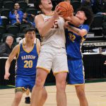 Mt. Edgecumbes Donovan Stephan-Standifer (35) powers up a shot against Barrows Jaziah Tivao (32) during the Braves 81-73 win over the Whalers in the 3A boys 3rd/5th-place game Saturday at 2025 ASAA March Madness Alaska 3A/4A Basketball State Championships in Anchorages Alaska Airlines Center. (Klas Stolpe / Juneau Empire)